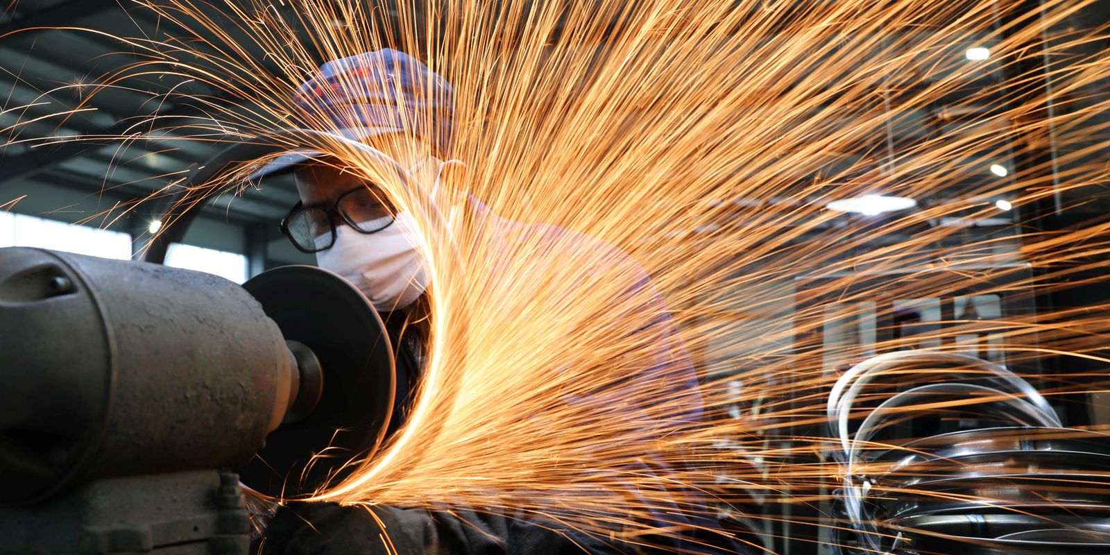 usina_siderurgica_mascara_de_protecao_industria.jpg © REUTERS/China Daily/Proibida reprodução